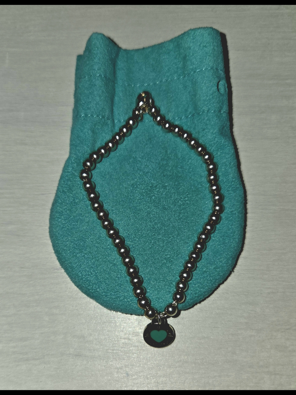 Tiffany & Co. Silver Bead Bracelet with Teal Heart Charm